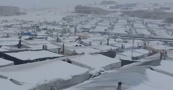 Arsal Syrian refugee camps in Lebanon covered with snow need urgent fuel and food