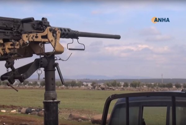 #PT Female Kurdish fighter driving T-72 MBT w/ slate armor, US provided M2 used against rebels, RuAF air support. 