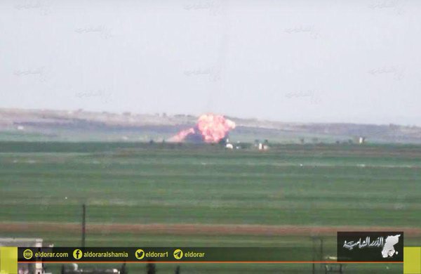 Burning Su-22 at Al-Eis. Pilot ejected and captured by Al-Nusra