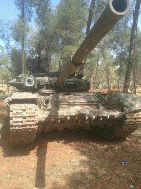 Syria JN/AQ captured 1 T-90A in Tal El Eis. Front kontakt-5 ERA bricks went off. 1 OTShU-1-7 missing,1 broken. 