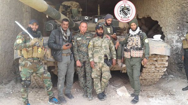 Imam Ali Brigades Fighters from Iraq  stationed at Aleppo Region. Russian T90  