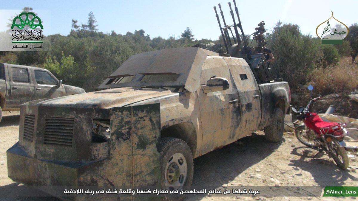 Some spoils taken today by Rebels in Kinsabba: up-armored pick-up with ZPU-4  and  several Konkurs ATGM. N. Latakia  