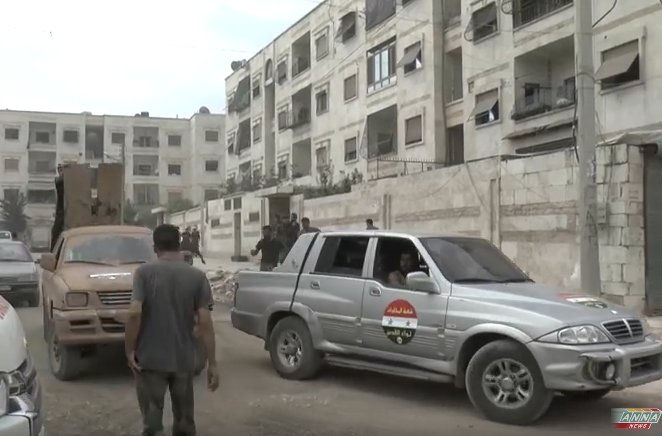 Liwa al-Quds armor near Ramouseh artillery base. T-55s, BREM-1 ARV, BMP-2.  