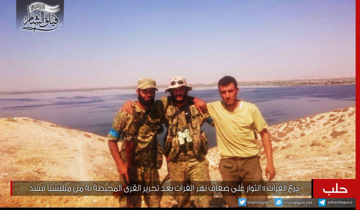 Sham Legion fighters on the shores of the Euphrates river after capturing villages in the area