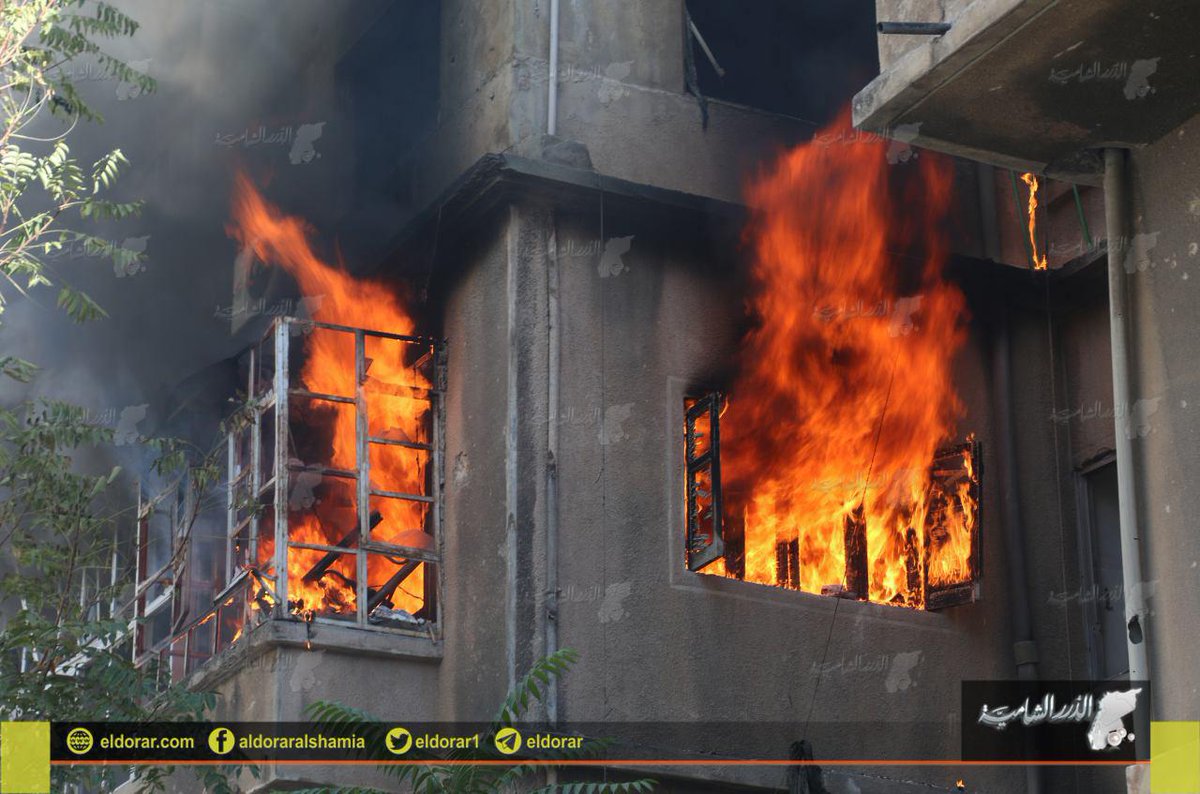 Conflagrations in residential buildings the neighborhoods of al-Mash'had Aleppo,after targeted with incendiary bombs  