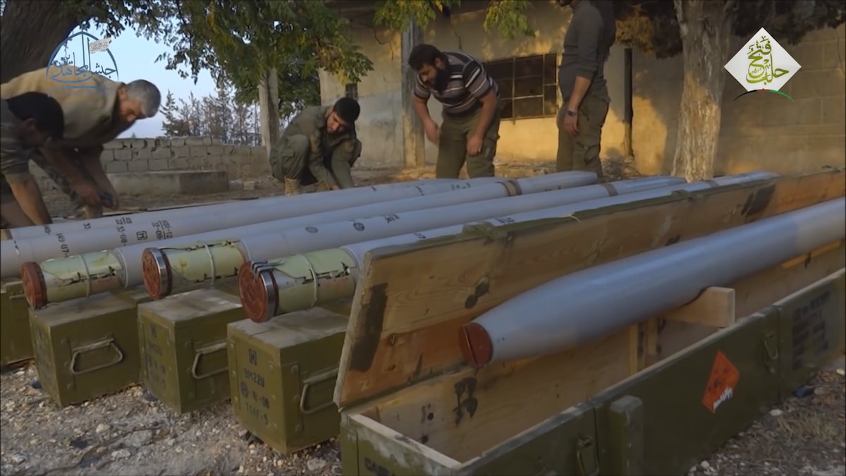 Rebels firing grad rockets in Aleppo at the military academy   