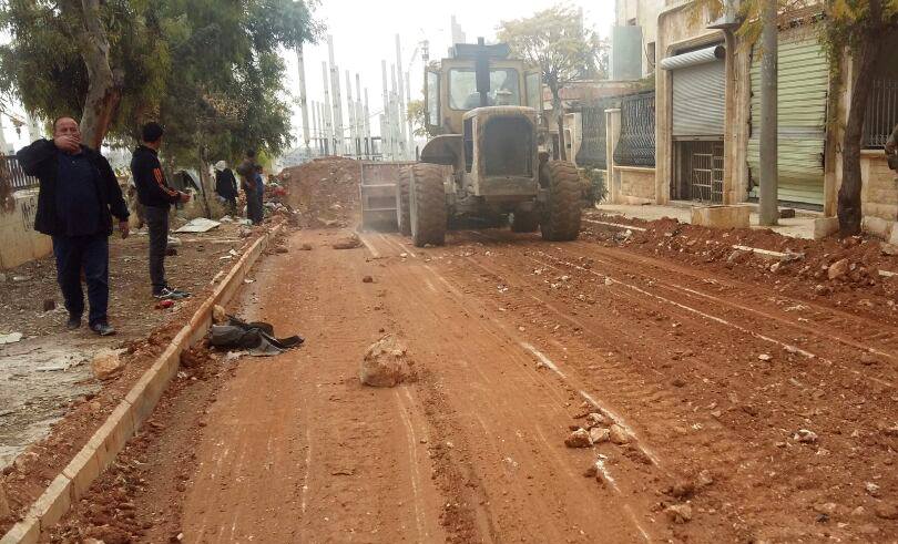 Reconstruction continues:Syrian gov. repairing roads after rebels attacks on Al Hamidaniyah/3000 Project, West Aleppo