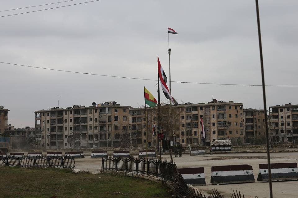 Syrian flag raised over areas under YPG (Kurdish control) in Sheikh Maqsoud, Aleppo after an agreement with the Syrian government today  