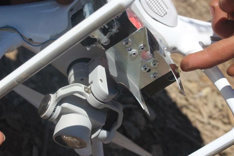 SDF fighters shot down an ISIS drone that was being used to drop bombs on their positions, near the Tabqa Airbase  