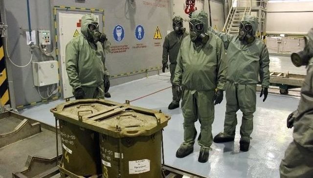 Recent .@SputnikInt photo from Shayrat Military Airbase shows what looks like Soviet chemical weapons alongside scattered RBK-500 cluster bomb caps (red).