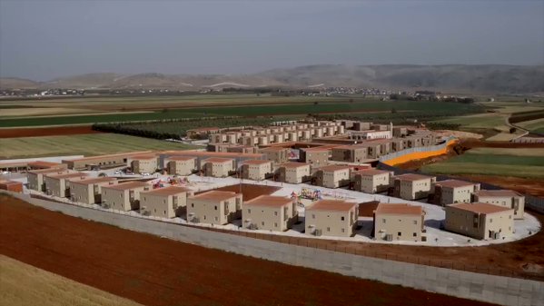 Aerial footage (with info.) of the new village complex to host Syrian refugees near the Turkey-Syria border