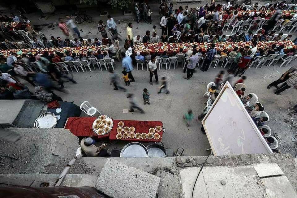 Joint iftar evening meal the besieged city of Douma for Syrian orphans  