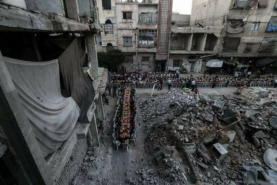 Joint iftar evening meal the besieged city of Douma for Syrian orphans  