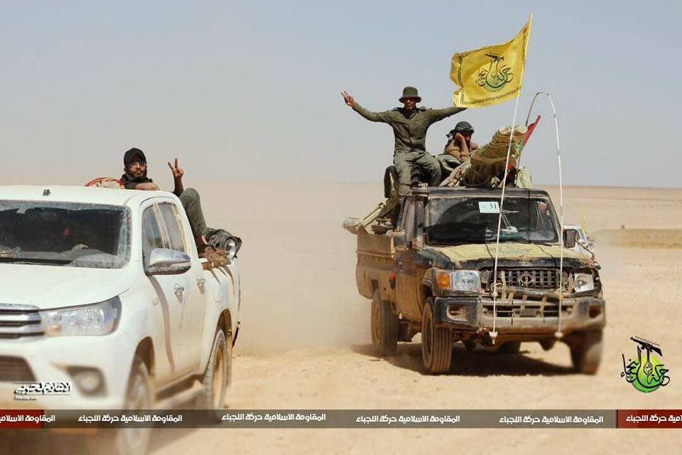 Harakat Hizbullah An-Nujaba convoy in the Syrian badiya along the Iraqi border.  