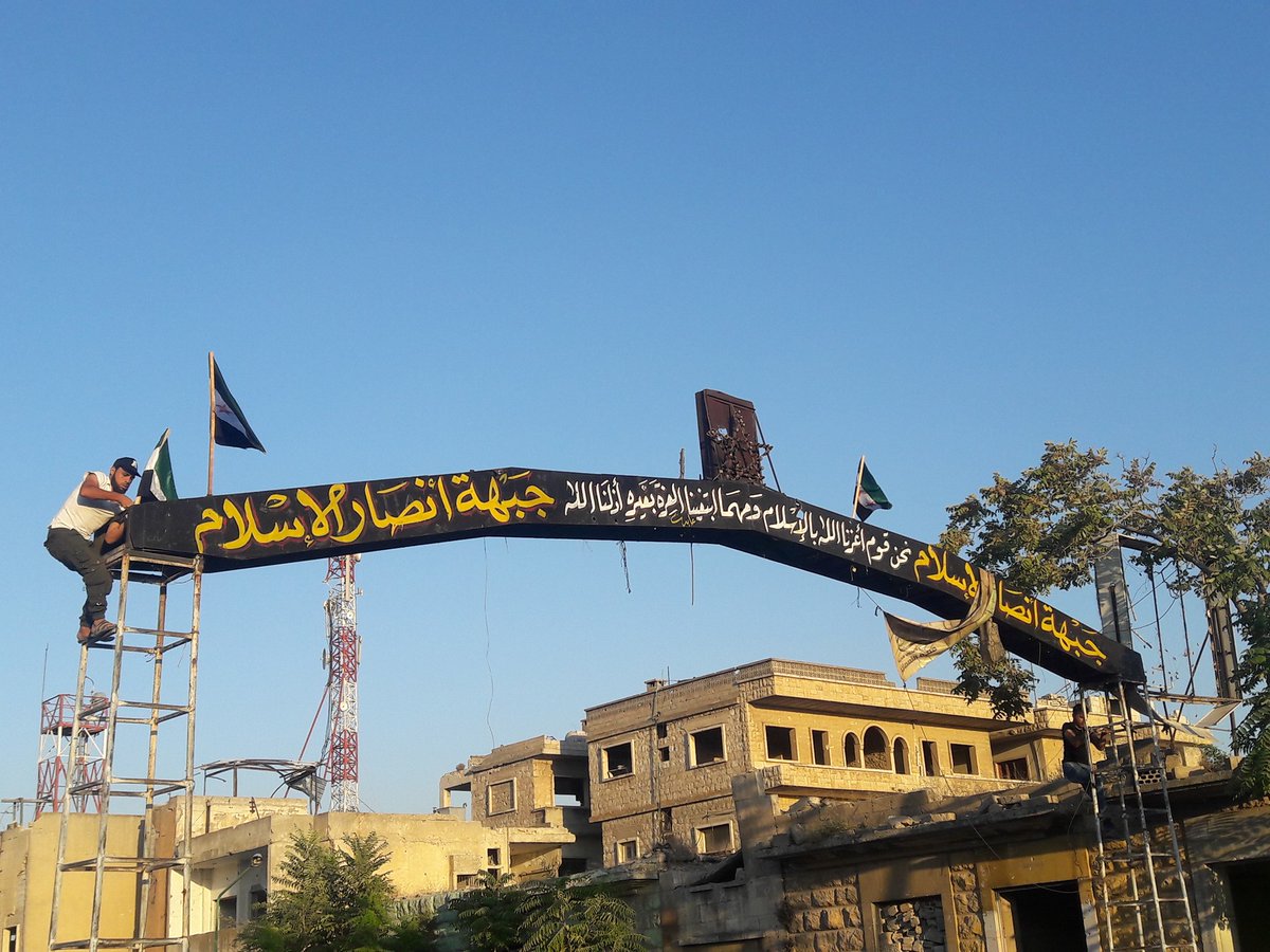 Protesters in Maarat a-Numan, Idlib, take down Jabhat a-Nusra (HTS) flags  and  chant against the group.  