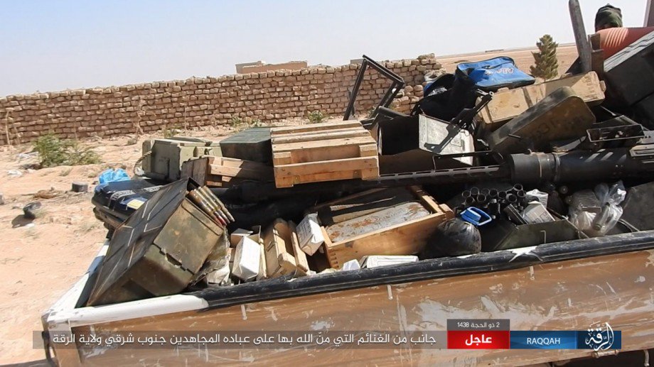 ISIS captured vehicles, weapons and ammunition from the Assad government