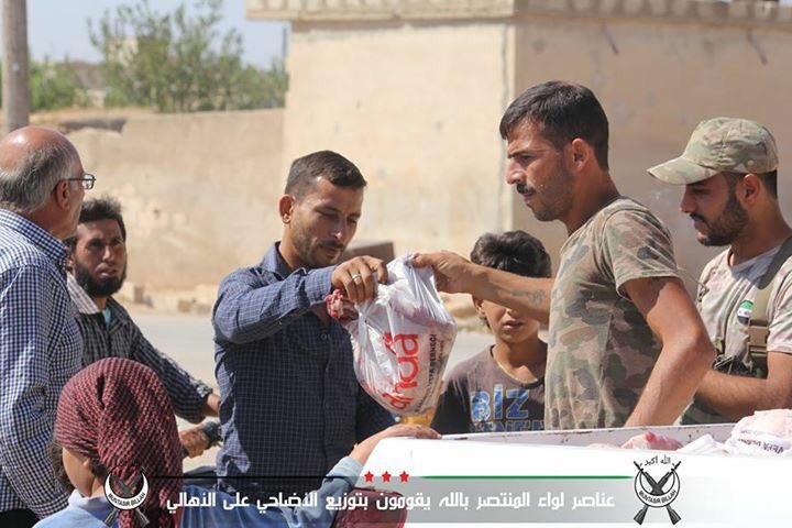 Syrian Turkmen rebels in northern Aleppo distribute aid to civilians during Eid al-Adha feast  