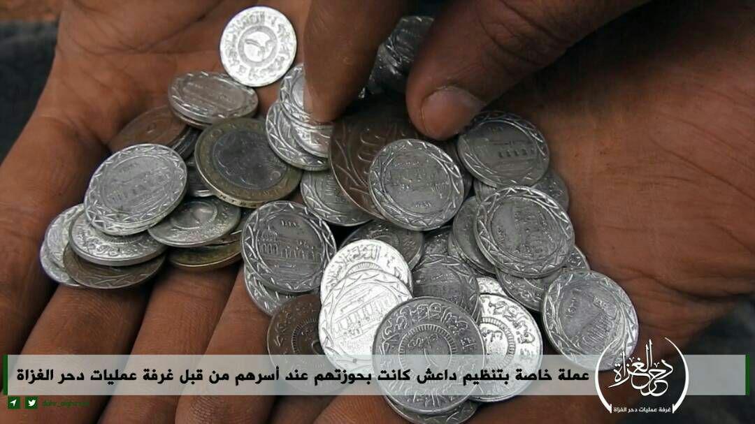 ISIS currency brought in by fighters captured on Khuwayn front.   