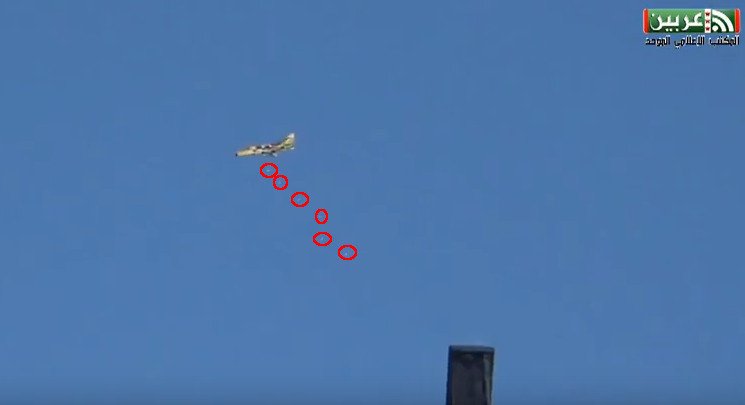 East Ghouta: SyAF Su-22 dropping its load of unguided bombs over a town.    