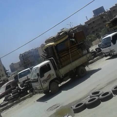 Assad's forces looting homes in the Palestinian Yarmouk camp.