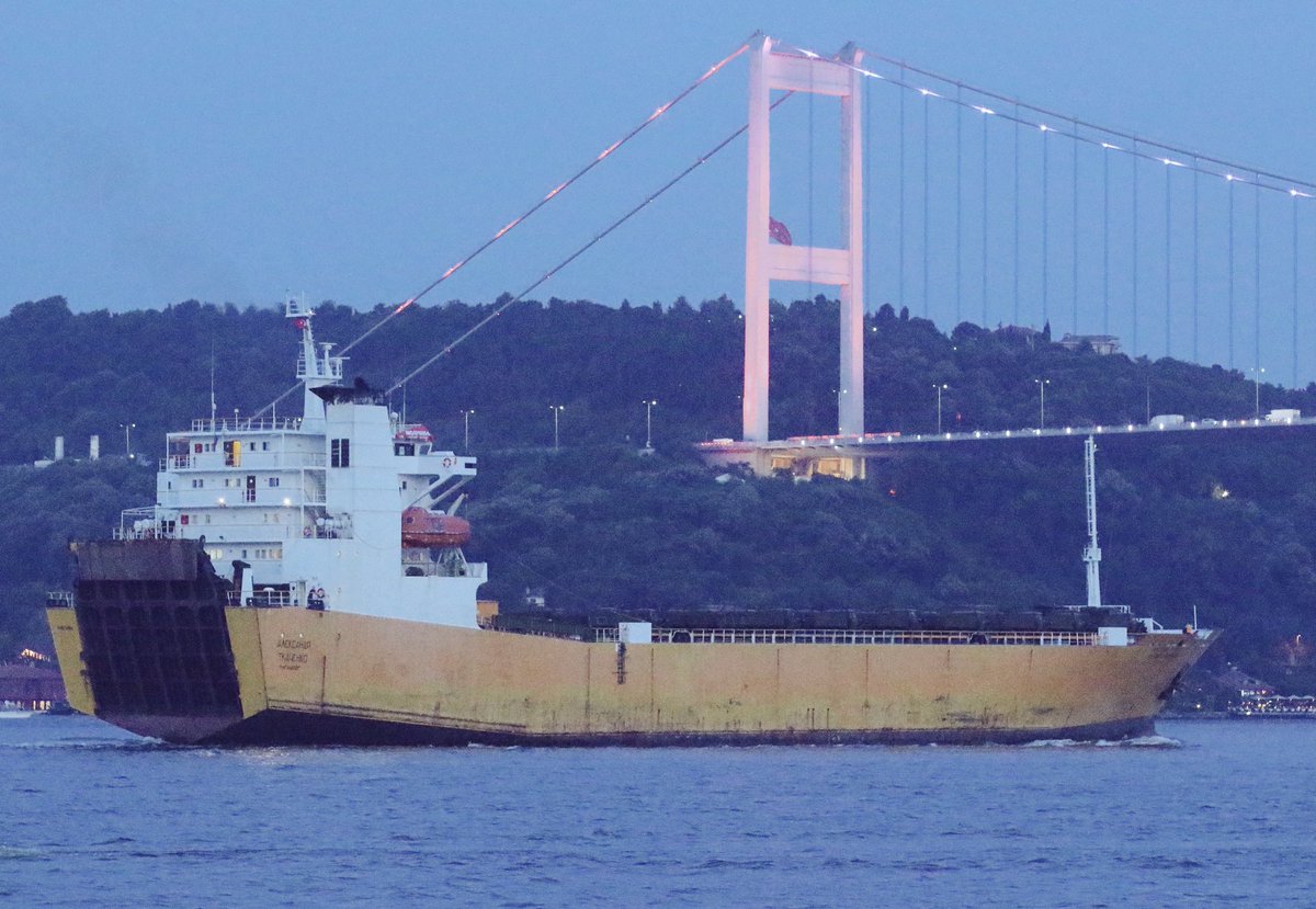 Supply and reinforcement for Russia's Syria campaign continues: Russian Government chartered, Russia flag RoRo Alexandr Tkachenko transits Mediterranean-bound Bosphorus at dusk en route to Tartus Syria carrying Ural 4320 trucks above the deck.   