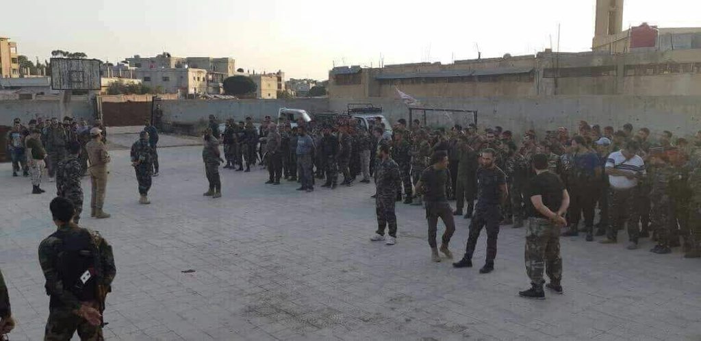 Sectarian Iraqi Shia militias Liwa Abu Al Fadl Al Abbas wearing Syrian Army uniform in Dael west Daraa with a Russian officer   