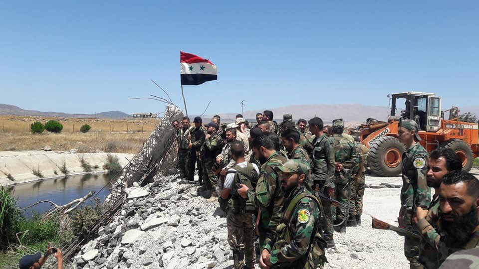 Syrian national flag raised in Quneitra   