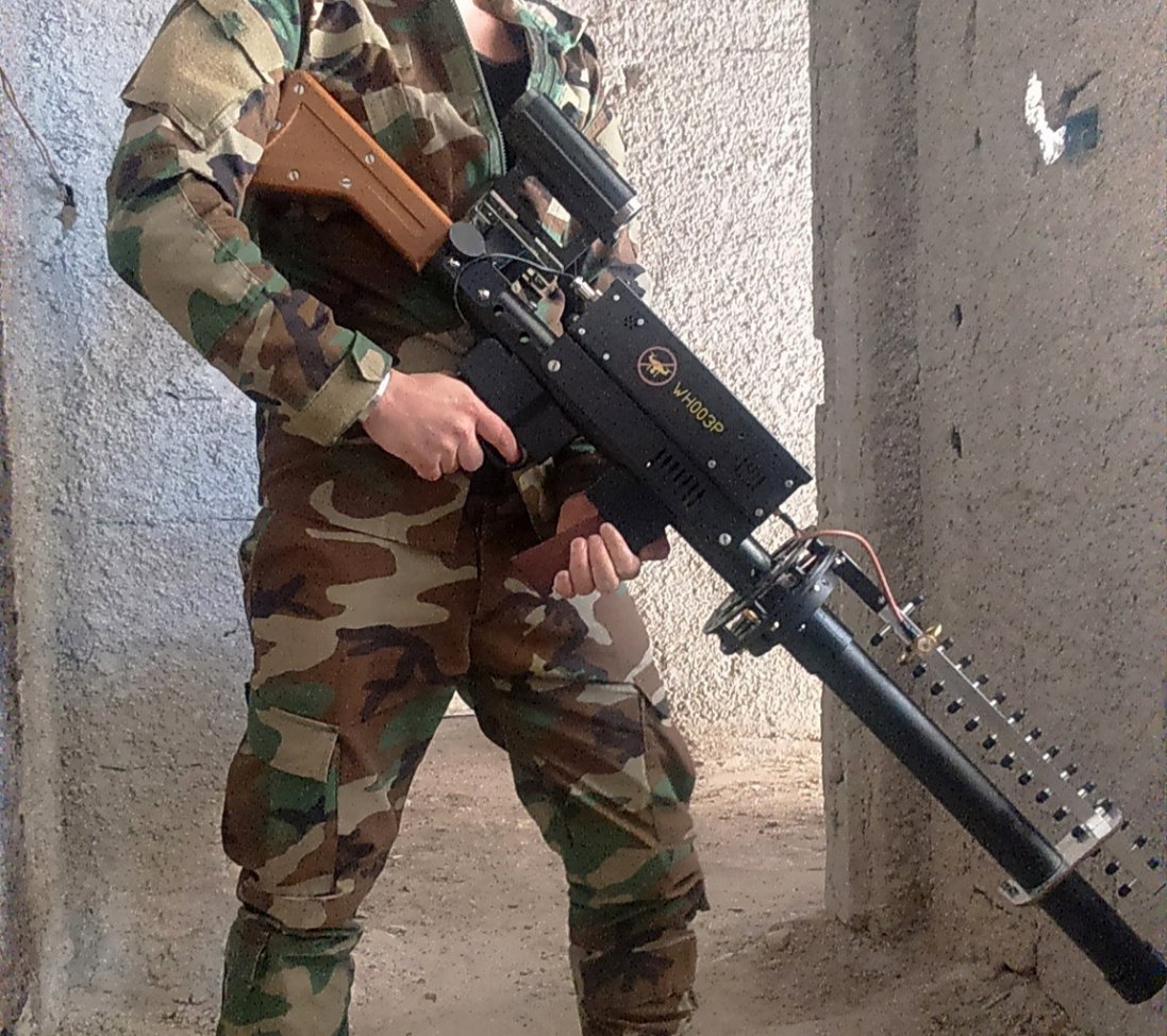 Soldier of SAA with what looks like anti drone gun.   