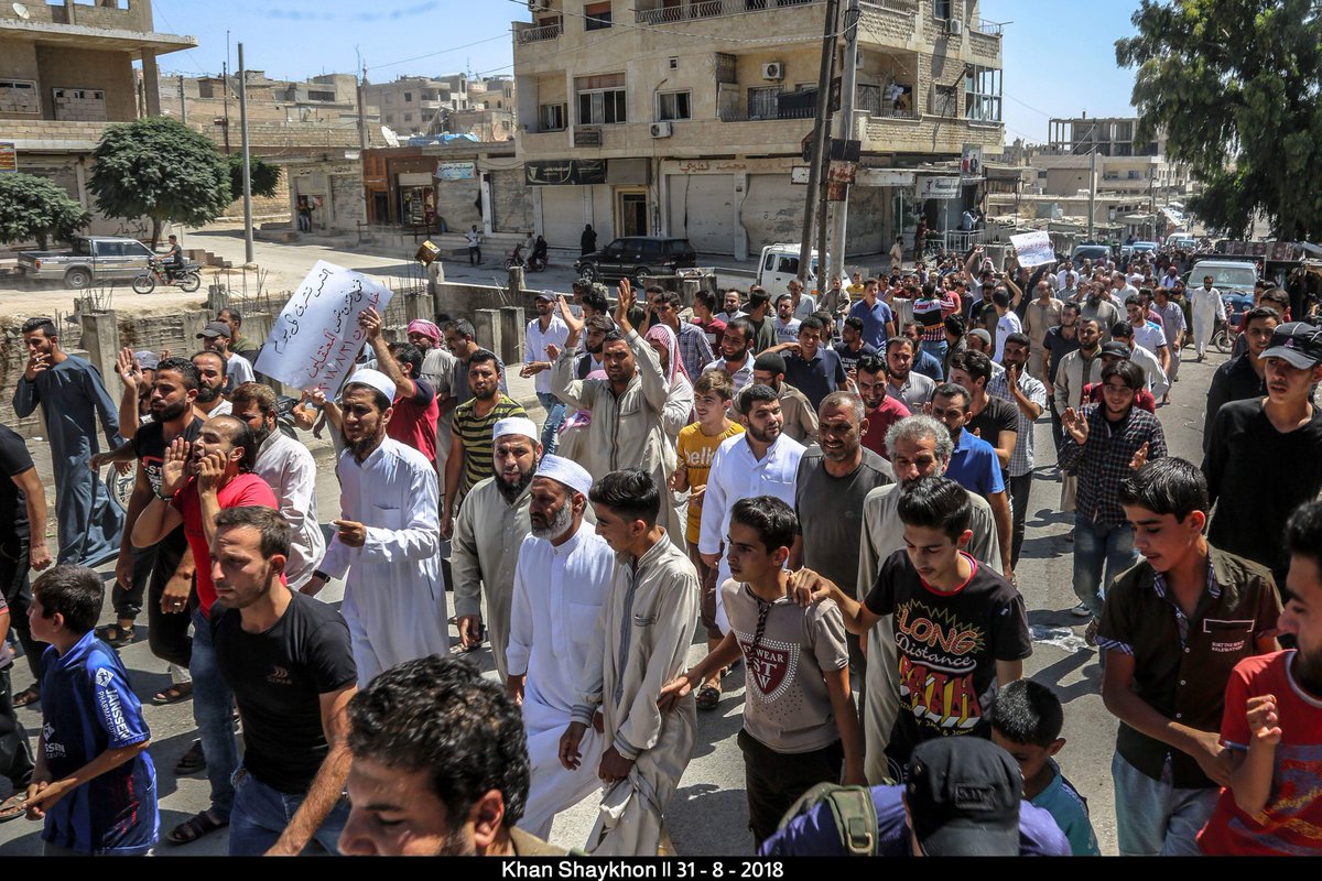 Demonstrators demanding from the Turkish forces to protect civilians