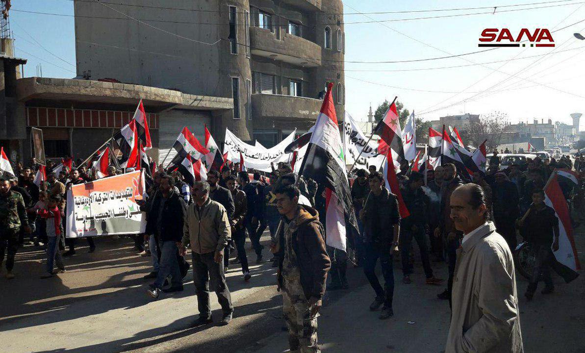 Hasaka protesters on the streets with Syrian flags. Syria   