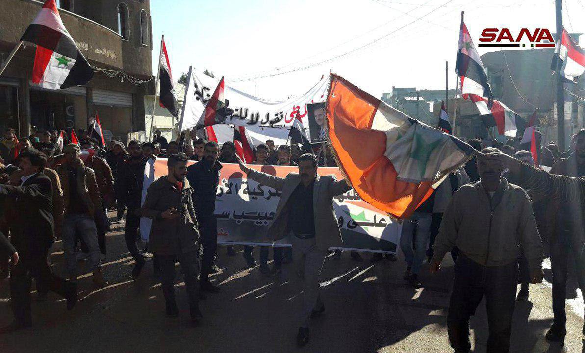 Hasaka protesters on the streets with Syrian flags. Syria   