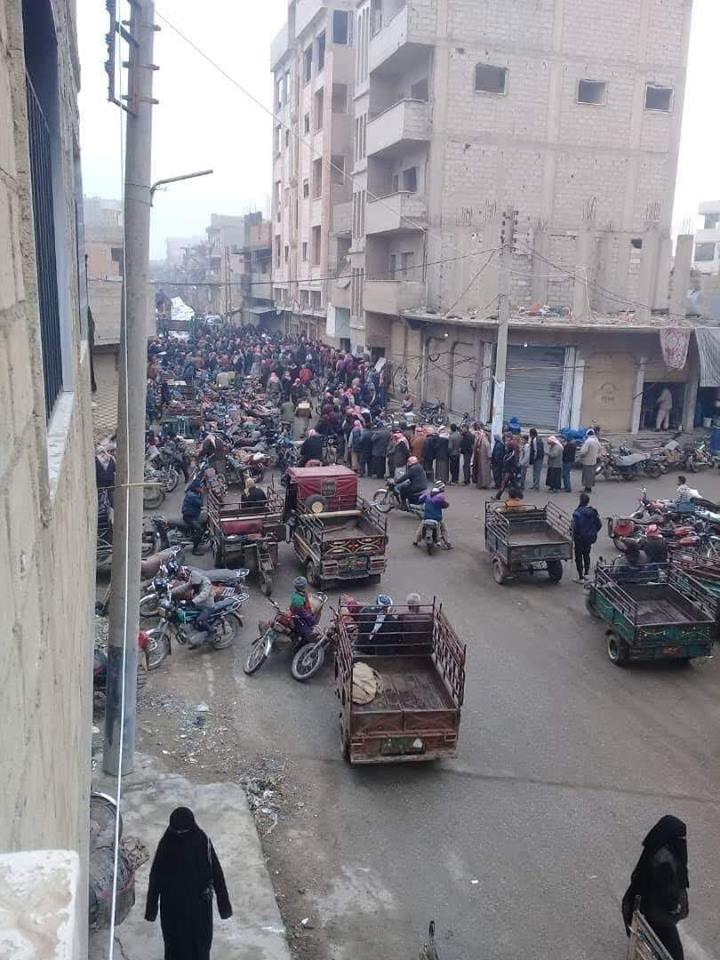 Queues of the people to get the daily supplies of gas, fuel and bread in the city of Mayadeen east of Deir Al-Zour