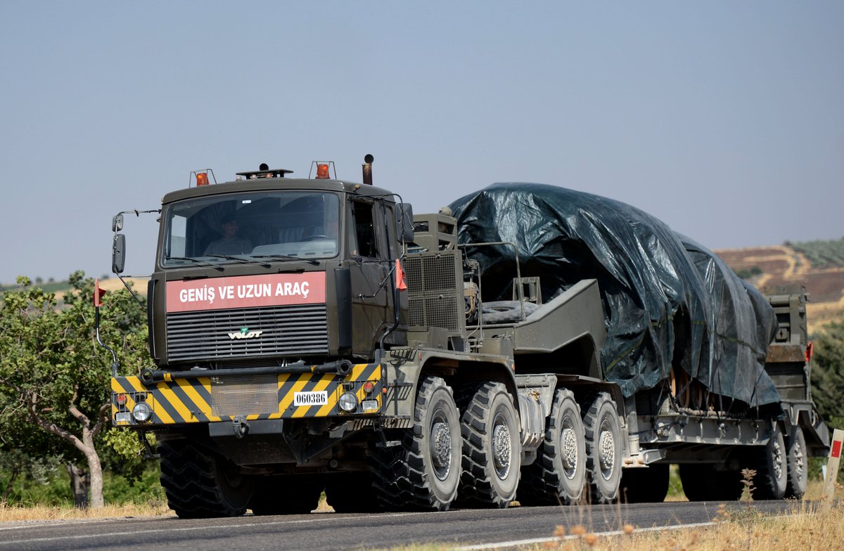 Turkish army's shipment continues. Military convoy consisting of howitzer and tank loaded on trucks sent from Kilis to border in Sanliurfa