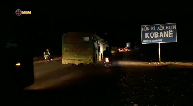 The first batch of five buses of Syrian government forces have arrived in the city of Ain Al Arab/Kobani