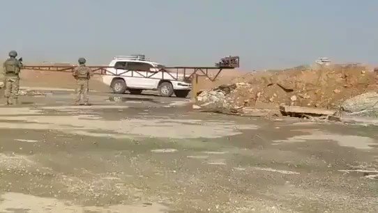 Turkish soldiers are standing near the M4 highway while American soldiers leaving towards Hasakah area. 