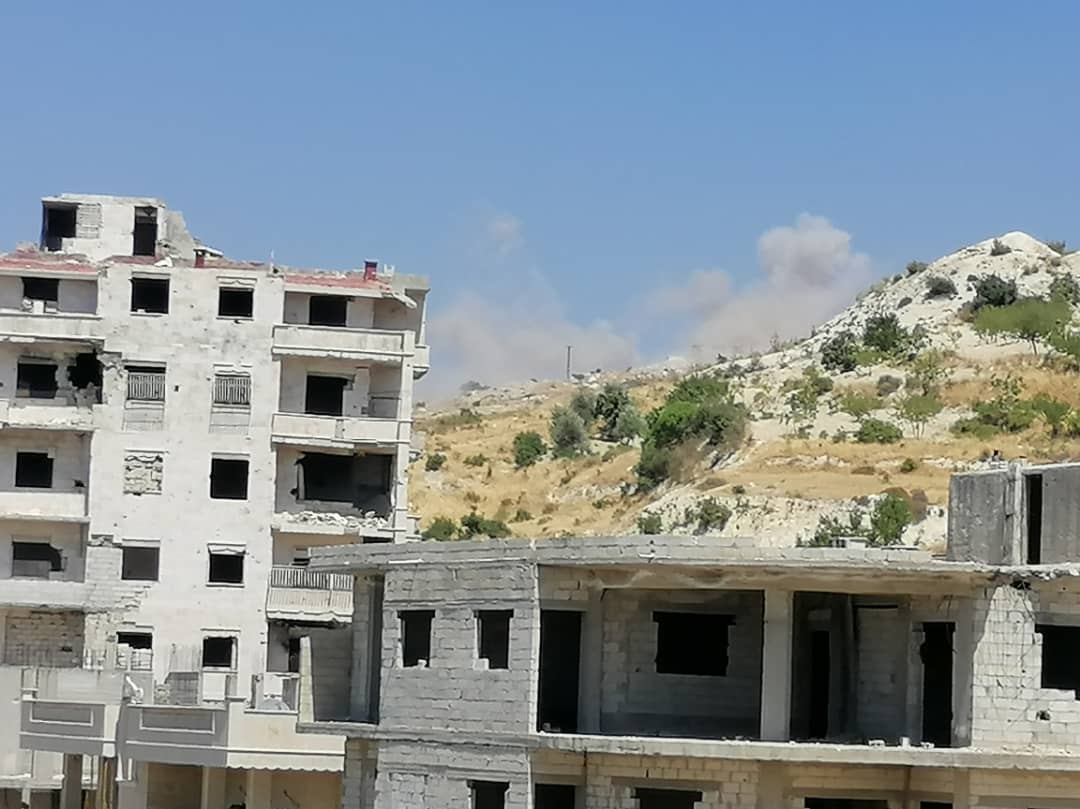 Pro-Assad forces target with rocket launchers, Ariha city in southern Idlib countryside