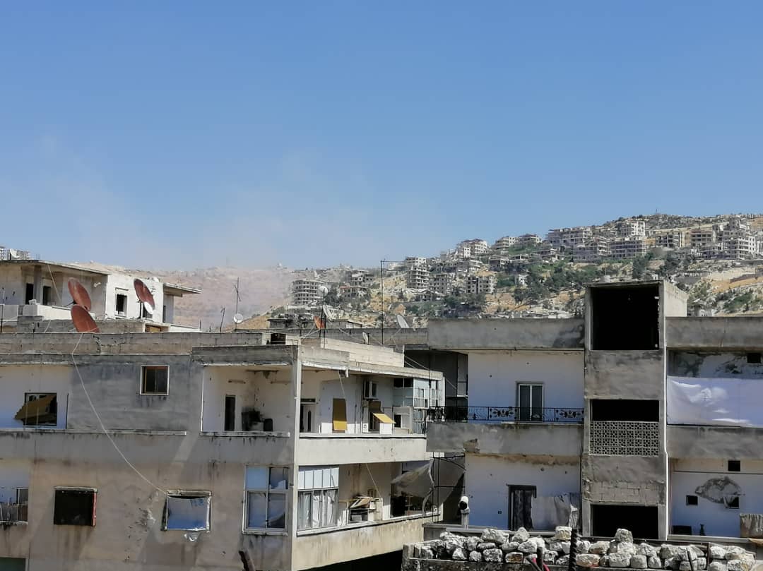 Pro-Assad forces target with rocket launchers, Ariha city in southern Idlib countryside