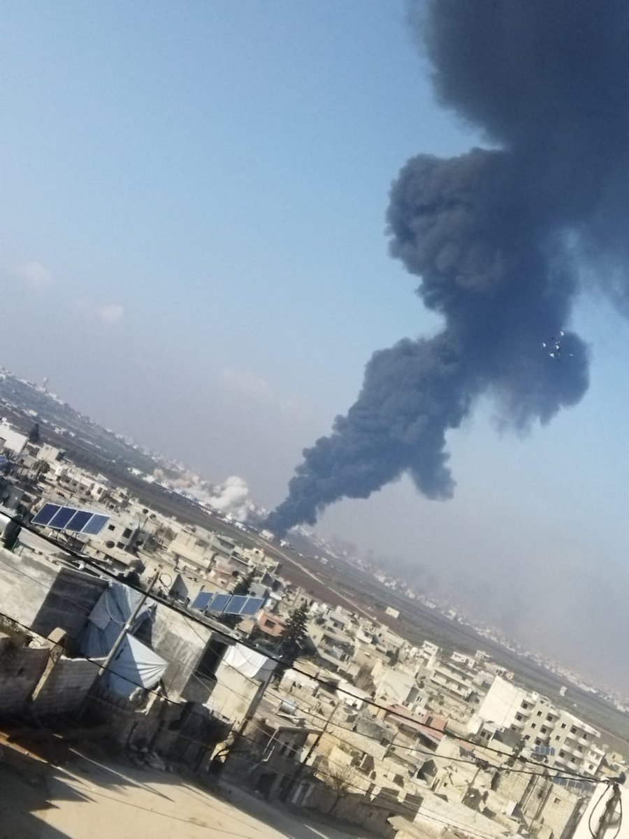 The cloud of smoke resulting from the bombing of the outskirts of the town of Termanin in the northern Idlib countryside