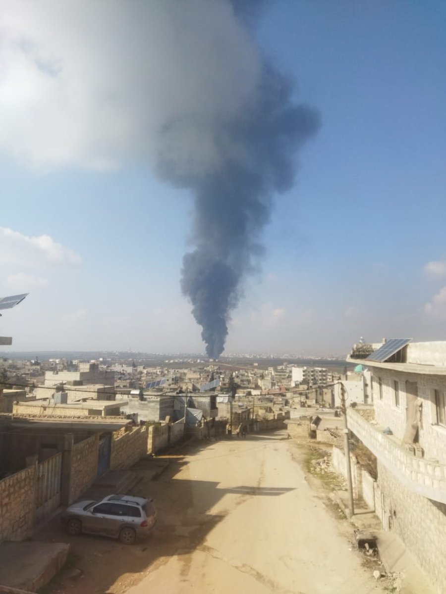 The cloud of smoke resulting from the bombing of the outskirts of the town of Termanin in the northern Idlib countryside