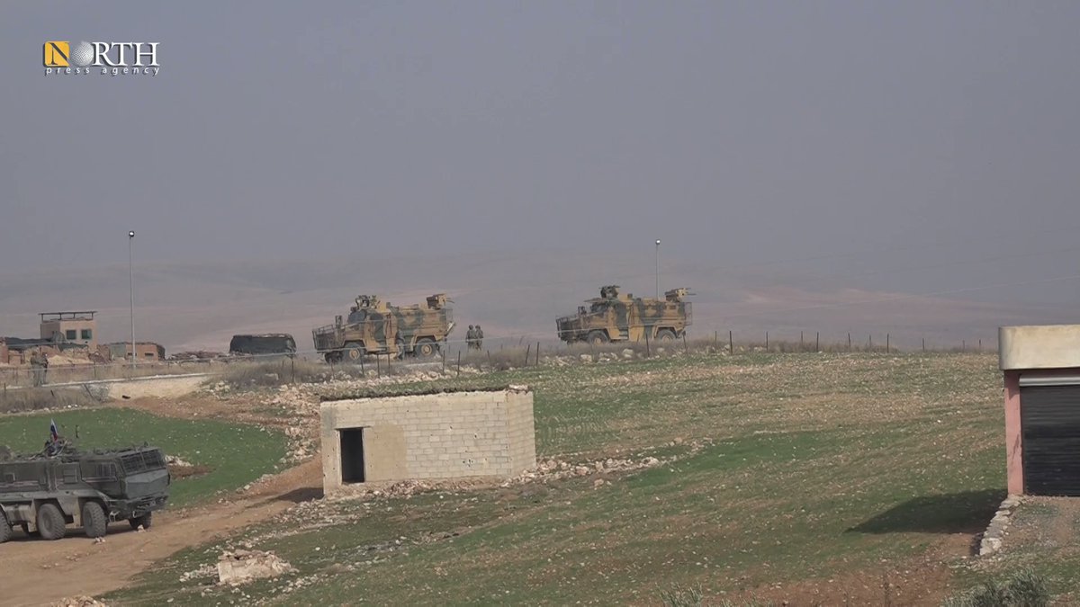 Russian-Turkish military vehicles conducted the 91st joint patrol in the western countryside of Syria's Kobani
