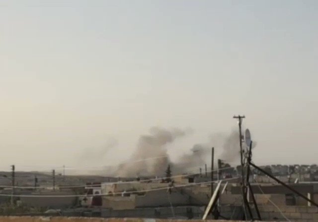 Heavy Turkish bombardment near Ayn Issa. Appears at least one vehicle has been destroyed