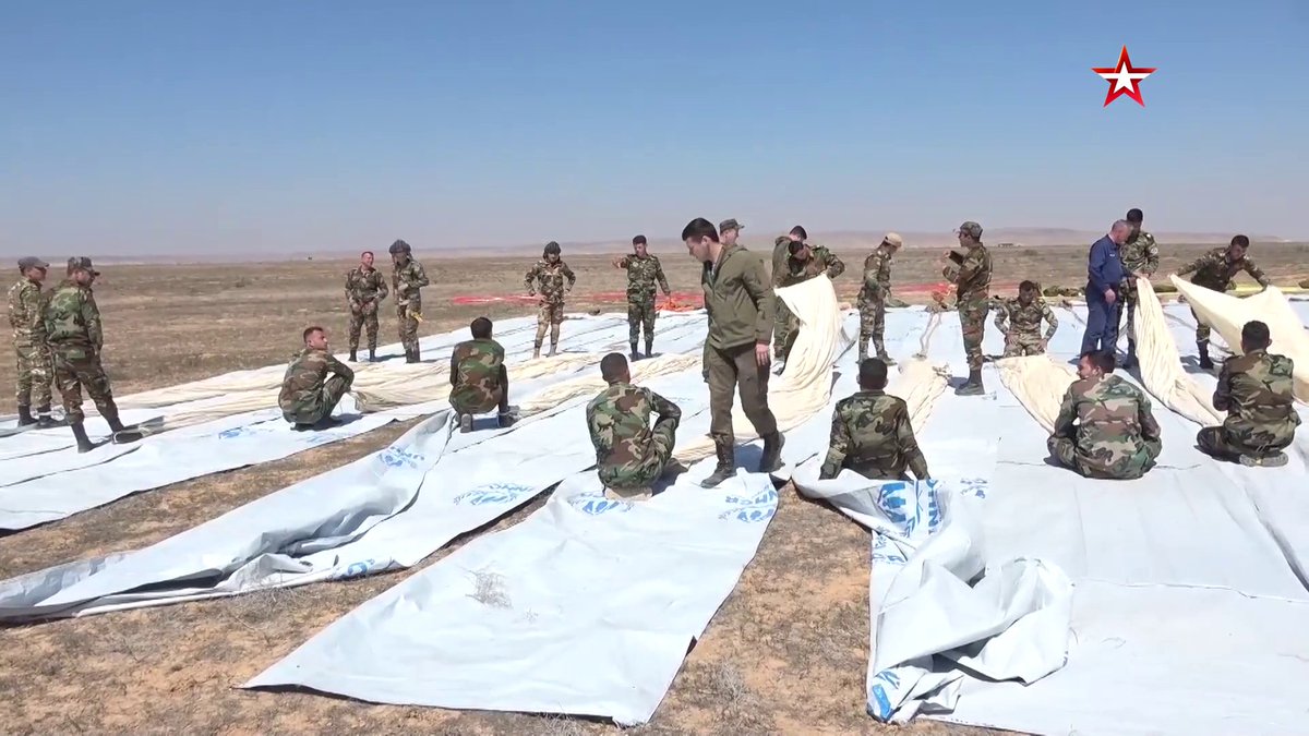 @obretix: Russian military instructors training SAA paratroopers south of Khanasir, with @UNHCRinSyria banners