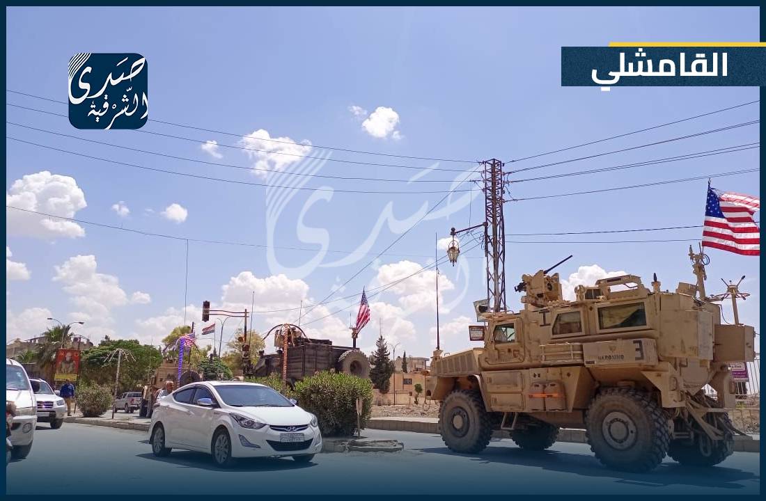 A military convoy of the international coalition forces in the center of the city of Qamishli on the four streets of Mafraq near the Sivan roundabout and the military security detachment of the Pro-Assad forces. Qamishli