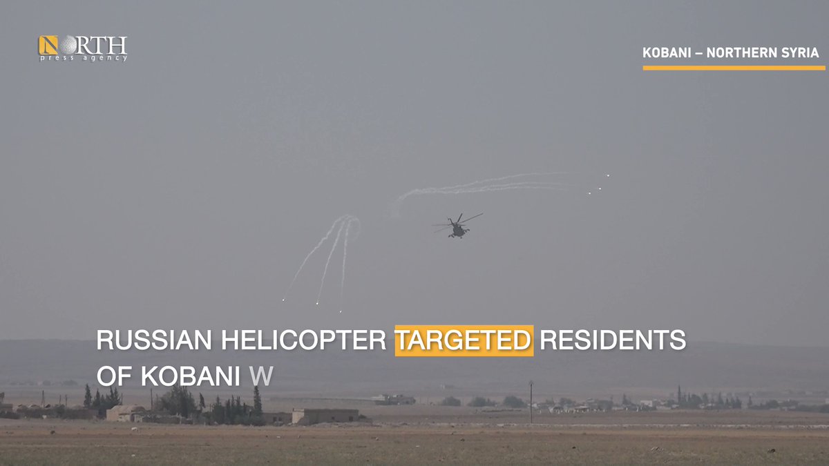 Russian helicopter fires tear gas at protesters in Syria's Kobani