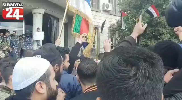 One of the protesters' chants moments before the storming of the governorate building in the city center of As-Suwayda: The people want to overthrow the Pro-Assad forces.