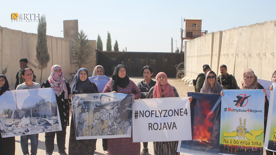 People protest ahead of US military base in the town of Rmelan, NE_Syria, denouncing Turkish attacks against the region