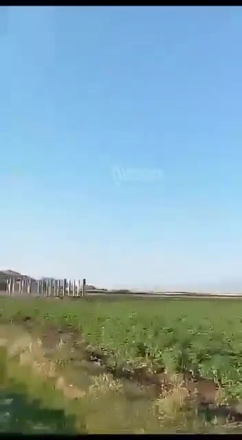 The moment a resident's car was targeted with an FPV drone by Assad forces in the village of Al-Zaqqum in Al-Ghab Plain