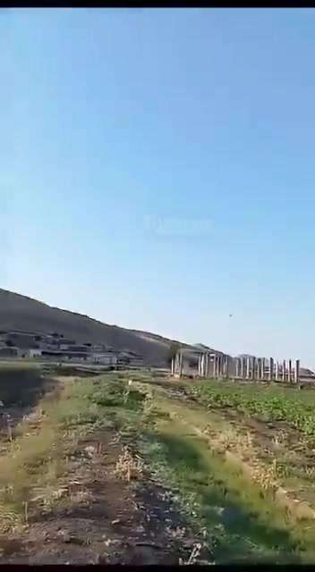 The moment a resident's car was targeted with an FPV drone by Assad forces in the village of Al-Zaqqum in Al-Ghab Plain