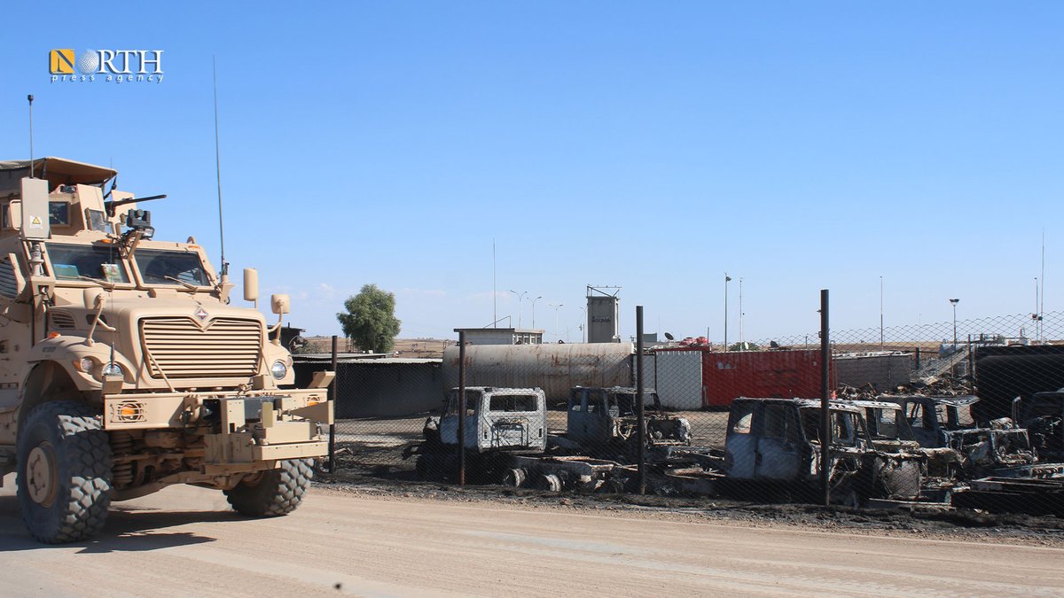 A US patrol roams near the Sweidiya gas plant and oil stations in the countryside of Derik in far NE_Syria after being hit by Turkish airstrikes