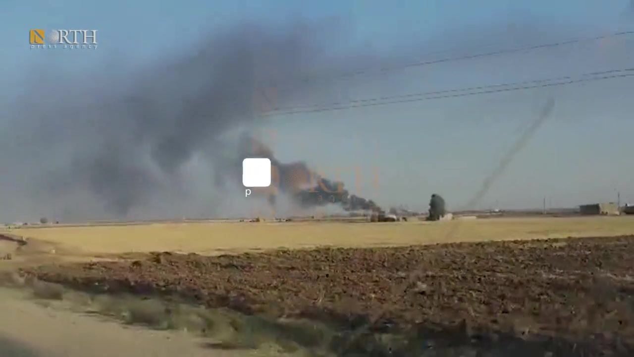 Smoke rising from an oil field in Tirbe Spiyeh (al-Qahtaniya) town in Northeast Syria due to Turkish airstrike.